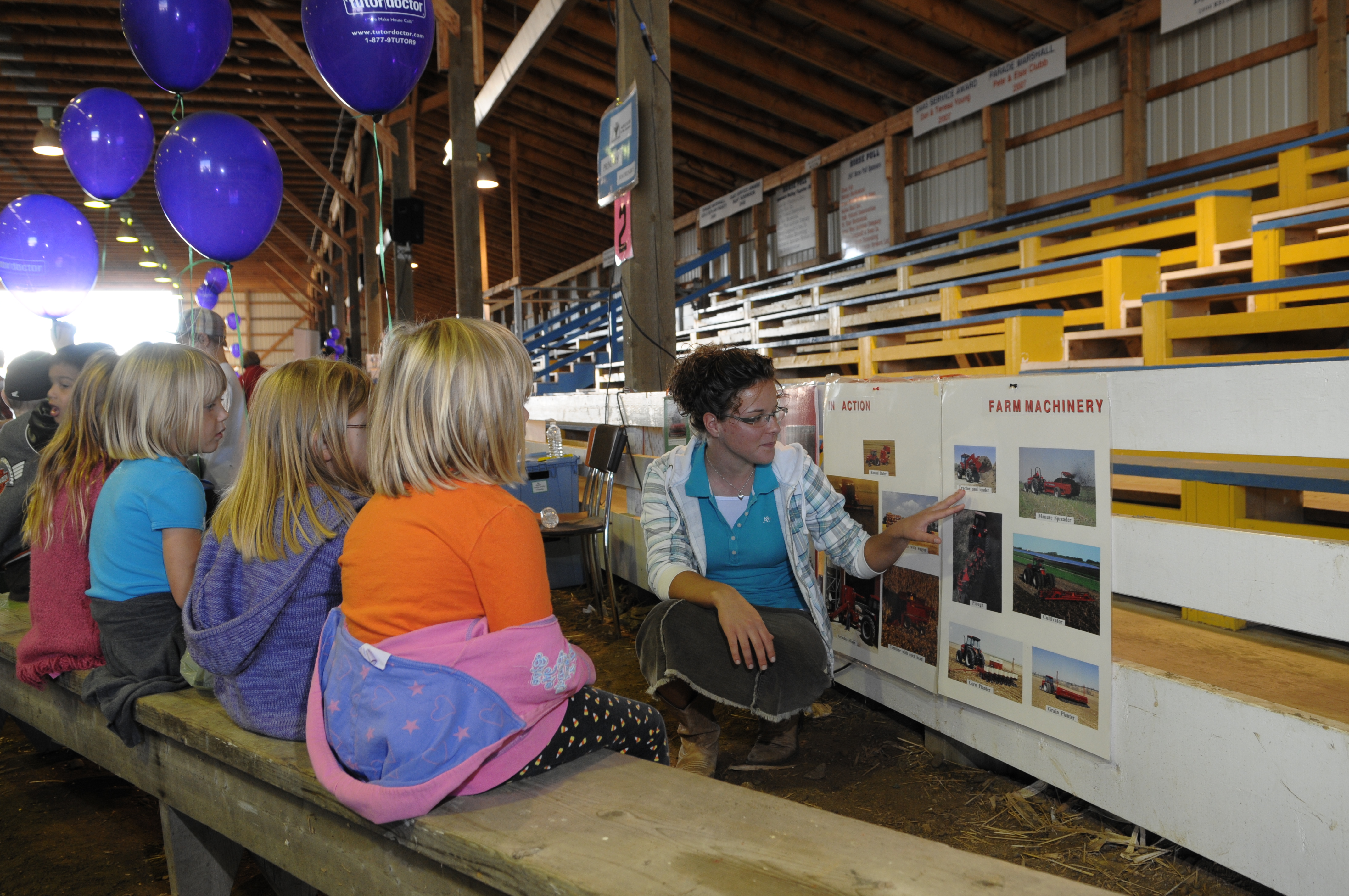 Kids looking at a poster